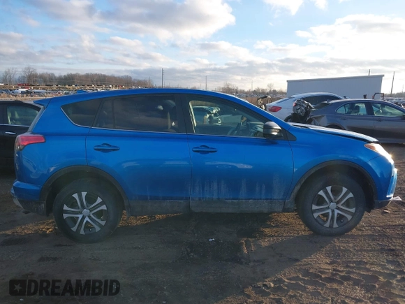 2018 Toyota RAV4 LE with VIN JTMBFREV4JJ717092, listed as a IAAI auction lot 41492235 with 127,643 mi miles. Bid and sale history available at carsss.com. Image 13.