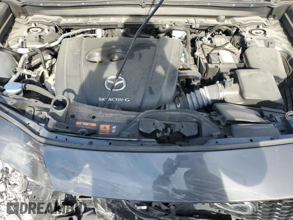 2021 Mazda CX-30 Premium z VIN 3MVDMBDL2MM315521, wystawiony jako Copart lot #75791414 z przebiegiem 23 515 mil mil oraz Szkoda całkowita • Salvage title. Historia ofert i sprzedaży dostępna na DreamBid. Obrazek 13.