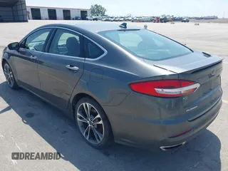 2020 Ford Fusion Titanium with VIN 3FA6P0D9XLR131042, listed as a IAAI auction lot 42560444 with 95,351 mi miles and . Bid and sale history available at DreamBid. Image 3.