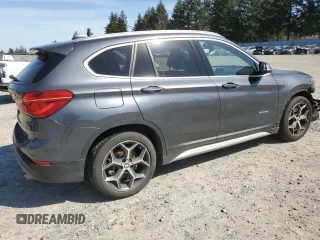 2016 BMW X1 xDrive28i with VIN WBXHT3C39GP882906, listed as a Copart auction lot 52409705 with 57,019 mi miles and Salvage Title. Bid and sale history available at carsss.com. Image 3.