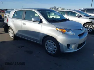 2013 Scion xD with VIN JTKKUPB48D1030670, listed as a IAAI auction lot 41774170 with 98,985 mi miles. Bid and sale history available at carsss.com. Image 1.