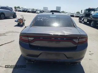 2015 Dodge Charger SXT z VIN 2C3CDXHG7FH765002, wystawiony jako Copart lot #52357755 z przebiegiem 132 453 mil mil oraz Szkoda całkowita • Salvage title. Historia ofert i sprzedaży dostępna na DreamBid. Obrazek 6.