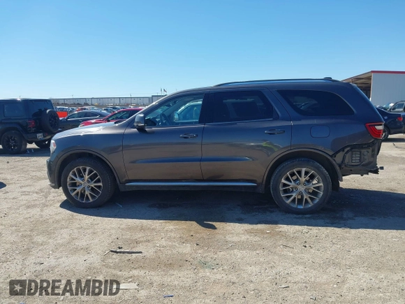 2016 Dodge Durango Limited with VIN 1C4RDJDG9GC433365, listed as a IAAI auction lot 41751149 with 199,547 mi miles and . Bid and sale history available at DreamBid. Image 14.