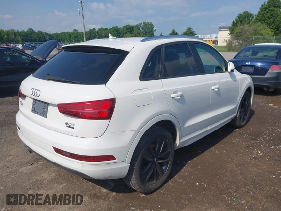 2017 Audi Q3 Premium z VIN WA1ECCFS7HR009402, wystawiony jako IAAI lot #42462248 z przebiegiem 46 536 mil mil oraz . Historia ofert i sprzedaży dostępna na DreamBid. Obrazek 4.