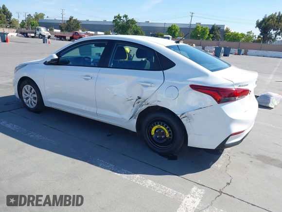 2021 Hyundai Accent SE z VIN 3KPC24A6XME153337, wystawiony jako IAAI lot #42344593 z przebiegiem 86 079 mil mil oraz . Historia ofert i sprzedaży dostępna na DreamBid. Obrazek 3.