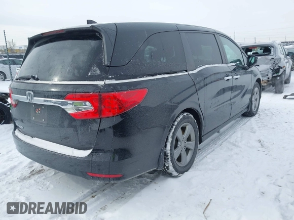 2018 Honda Odyssey EX-L z VIN 5FNRL6H79JB012735, wystawiony jako IAAI lot #41552799 z przebiegiem 29 253 mil mil oraz . Historia ofert i sprzedaży dostępna na DreamBid. Obrazek 4.