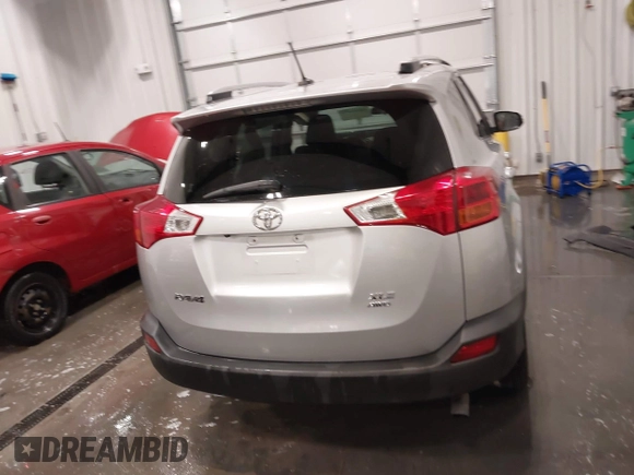 2014 Toyota RAV4 XLE with VIN JTMRFREV5ED052819, listed as a IAAI auction lot 42014672 with 235,481 mi miles and . Bid and sale history available at DreamBid. Image 17.