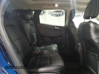 2020 Ford Escape Titanium z VIN 1FMCU9J98LUA93393, wystawiony jako Copart lot #65366925 z przebiegiem 74 750 mil mil oraz Czysty tytuł • Clean title. Historia ofert i sprzedaży dostępna na DreamBid. Obrazek 11.