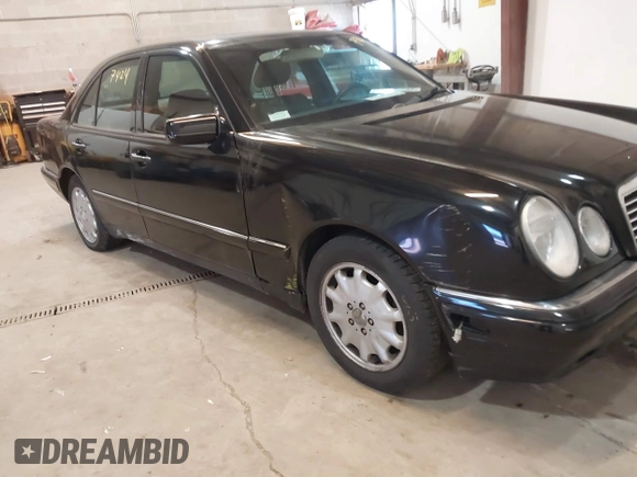 1998 Mercedes-Benz E-Class with VIN WDBJF65F7WA617755, listed as a IAAI auction lot 41737424 with 113,068 mi miles. Bid and sale history available at carsss.com. Image 6.