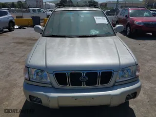 2001 Subaru Forester S w/Premium Pkg with VIN JF1SF65651H757251, listed as a IAAI auction lot 42101284 with 212,856 mi miles. Bid and sale history available at carsss.com. Image 6.