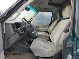 2002 Volkswagen EuroVan MV с VIN WV2NB47092H095600, выставлен на аукционе Copart как лот 50705065 с пробегом 223 049 миль миль и Чистый • Clean title. История ставок и продаж доступна на DreamBid. Изображение 7.