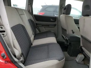 2006 Nissan X-Trail XE z VIN JN8BT08V06W201567, wystawiony jako Copart lot #73707064 z przebiegiem 298 525 mil mil oraz Szkody całkowita. Historia ofert i sprzedaży dostępna na DreamBid. Obrazek 11.