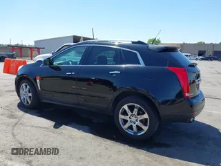 2012 Cadillac SRX Performance Collection z VIN 3GYFNBE30CS659973, wystawiony jako IAAI lot #42555119 z przebiegiem 141 842 mil mil oraz . Historia ofert i sprzedaży dostępna na DreamBid. Obrazek 14.
