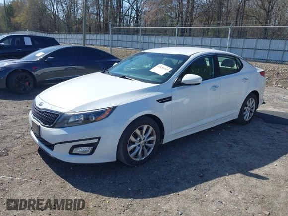 2015 Kia Optima LX with VIN 5XXGM4A70FG470686, listed as a IAAI auction lot 41828763 with 133,547 mi miles. Bid and sale history available at carsss.com. Image 2.