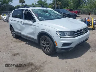 2018 Volkswagen Tiguan SEL with VIN 3VV3B7AX4JM201878, listed as a IAAI auction lot 42083809 with 115,956 mi miles and . Bid and sale history available at DreamBid. Image 1.