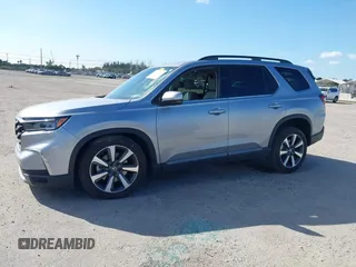 2023 Honda Pilot Elite with VIN 5FNYG1H83PB018826, listed as a IAAI auction lot 41301261 with 23,252 mi miles. Bid and sale history available at carsss.com. Image 2.