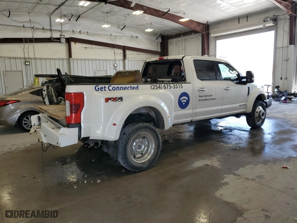 2019 Ford Super Duty F-450 DRW XL with VIN 1FT8W4DT0KEG00875, listed as a Copart auction lot 69857694 with 128,581 mi miles and Salvage Title. Bid and sale history available at carsss.com. Image 3.
