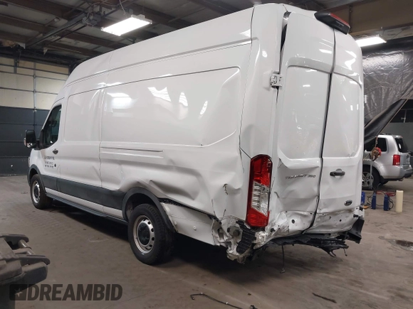 2021 Ford Transit Cargo with VIN 1FTBW3X83MKA06759, listed as a IAAI auction lot 41523717 with 12,116 mi miles. Bid and sale history available at carsss.com. Image 3.