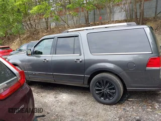 2015 Lincoln Navigator z VIN 5LMJJ3JT3FEJ07172, wystawiony jako IAAI lot #42313343 z przebiegiem 189 807 mil mil oraz . Historia ofert i sprzedaży dostępna na DreamBid. Obrazek 14.