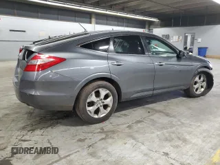 2010 Honda Crosstour EX-L z VIN 5J6TF2H54AL004179, wystawiony jako Copart lot #58410505 z przebiegiem 128 771 mil mil oraz Tytuł czysty. Historia ofert i sprzedaży dostępna na DreamBid. Obrazek 3.