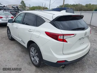 2019 Acura RDX w/Technology Pkg with VIN 5J8TC2H55KL031585, listed as a IAAI auction lot 41758776 with 55,144 mi miles. Bid and sale history available at carsss.com. Image 3.