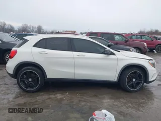 2015 Mercedes-Benz GLA 250 z VIN WDCTG4GB7FJ036868, wystawiony jako IAAI lot #41683576 z przebiegiem 100 975 mil mil oraz . Historia ofert i sprzedaży dostępna na DreamBid. Obrazek 14.