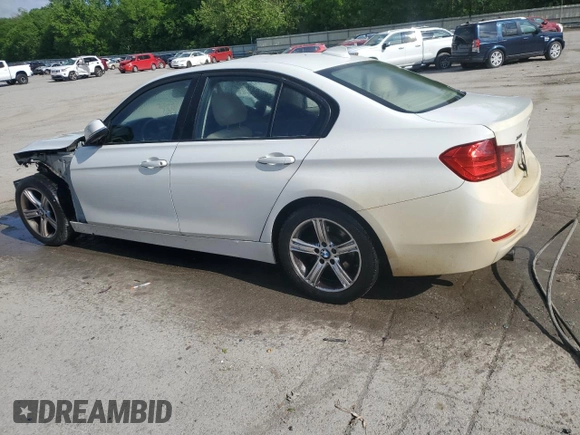 2013 BMW 3 Series 320i xDrive with VIN WBA3C3C57DF980971, listed as a Copart auction lot 57441155 with 131,263 mi miles and Salvage title. Bid and sale history available at DreamBid. Image 2.