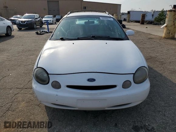 1999 Ford Taurus SE z VIN 1FAFP58S0XA272714, wystawiony jako Copart lot #48966215 z przebiegiem 255 885 mil mil oraz Szkoda całkowita • Salvage title. Historia ofert i sprzedaży dostępna na DreamBid. Obrazek 5.