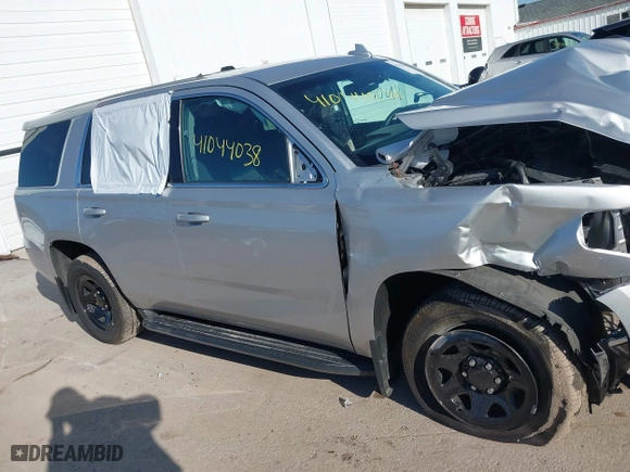 2018 Chevrolet Tahoe Commercial with VIN 1GNSKDEC1JR340887, listed as a IAAI auction lot 41044038 with 99,500 mi miles. Bid and sale history available at carsss.com. Image 13.