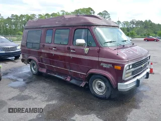 1994 Chevrolet Chevy Van z VIN 1GBEG25K4RF177057, wystawiony jako IAAI lot #42090808 z przebiegiem 123 654 mil mil oraz . Historia ofert i sprzedaży dostępna na DreamBid. Obrazek 1.
