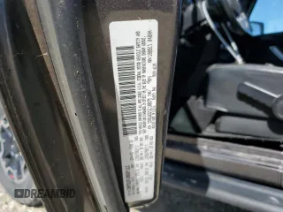 2014 Jeep Wrangler Rubicon with VIN 1C4BJWCG1EL168575, listed as a Copart auction lot 75095814 with 65,770 mi miles and Salvage title. Bid and sale history available at DreamBid. Image 12.