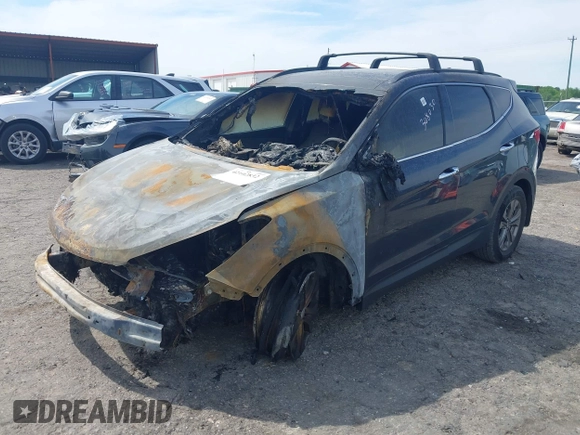 2016 Hyundai Santa Fe z VIN 5XYZU3LB4GG308030, wystawiony jako IAAI lot #42102832 z przebiegiem Nie podano mil oraz . Historia ofert i sprzedaży dostępna na DreamBid. Obrazek 2.