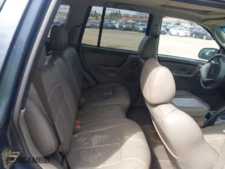 2004 Jeep Grand Cherokee Limited with VIN 1J8GW58N44C274714, listed as a IAAI auction lot 41922819 with 204,251 mi miles. Bid and sale history available at carsss.com. Image 8.