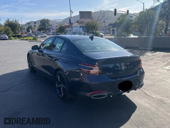 2023 Genesis G70 3.3T with VIN KMTG54TE6PU106021, listed as a Copart auction lot 86750284 with 8,669 mi miles and Salvage Title. Bid and sale history available at DreamBid. Image 3.