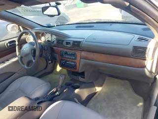 2005 Chrysler Sebring Limited with VIN 1C3EL65R15N638313, listed as a IAAI auction lot 42090291 with 80,105 mi miles and . Bid and sale history available at DreamBid. Image 5.