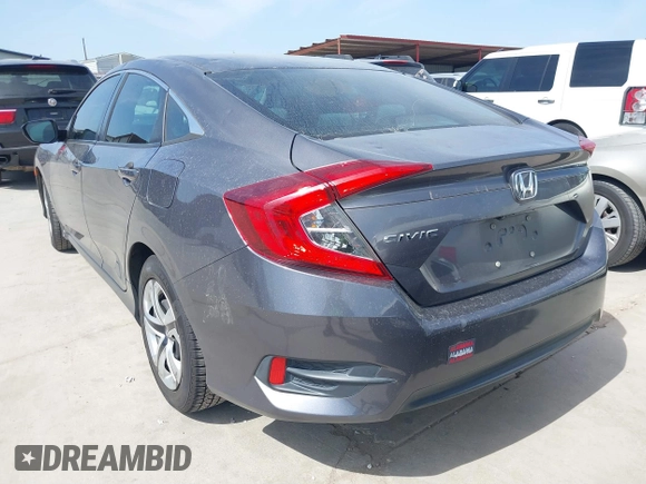 2016 Honda Civic Sedan LX with VIN 2HGFC2F58GH501113, listed as a IAAI auction lot 41826725 with 115,121 mi miles. Bid and sale history available at carsss.com. Image 3.