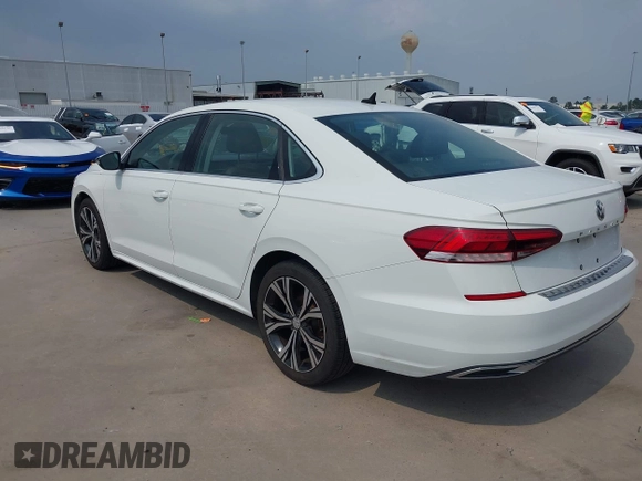 2021 Volkswagen Passat SE z VIN 1VWSA7A32MC014376, wystawiony jako IAAI lot #42314372 z przebiegiem 81 209 mil mil oraz . Historia ofert i sprzedaży dostępna na DreamBid. Obrazek 3.