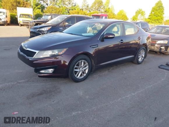 2013 Kia Optima LX with VIN 5XXGM4A71DG124725, listed as a IAAI auction lot 42041768 with 184,181 mi miles and . Bid and sale history available at carsss.com. Image 2.