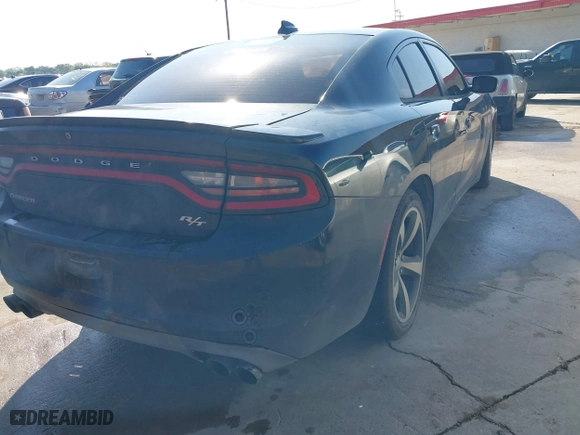 2017 Dodge Charger R/T with VIN 2C3CDXCT7HH571870, listed as a IAAI auction lot 41982710 with 196,865 mi miles. Bid and sale history available at carsss.com. Image 4.