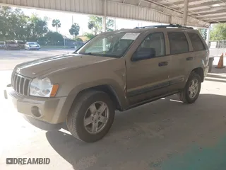 2005 Jeep Grand Cherokee Laredo with VIN 1J8HR48N95C713185, listed as a IAAI auction lot 41777242 with 95,262 mi miles. Bid and sale history available at carsss.com. Image 17.
