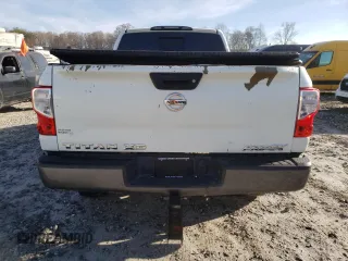2017 Nissan Titan Pro-4X z VIN 1N6BA1F42HN571085, wystawiony jako Copart lot #49859795 z przebiegiem 163 835 mil mil oraz Tytuł czysty. Historia ofert i sprzedaży dostępna na DreamBid. Obrazek 6.