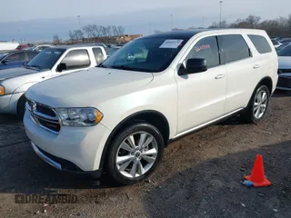 2012 Dodge Durango SXT with VIN 1C4RDHAG6CC335790, listed as a IAAI auction lot 41605378 with 204,306 mi miles and . Bid and sale history available at DreamBid. Image 2.