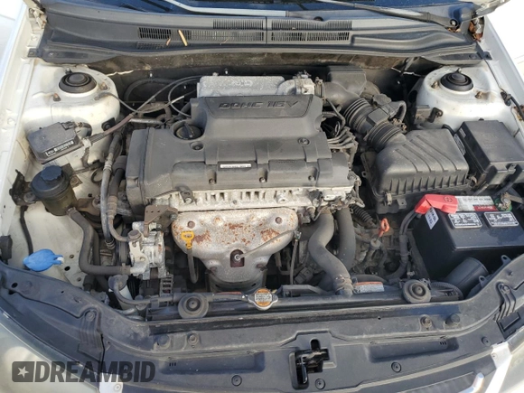 2009 Kia Spectra EX with VIN KNAFE221195630944, listed as a Copart auction lot 42291345 with 83,269 mi miles and Salvage Title. Bid and sale history available at DreamBid. Image 11.