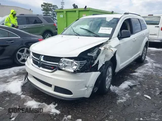 2018 Dodge Journey SE with VIN 3C4PDCAB1JT295988, listed as a IAAI auction lot 41226385 with 106,639 mi miles. Bid and sale history available at carsss.com. Image 17.