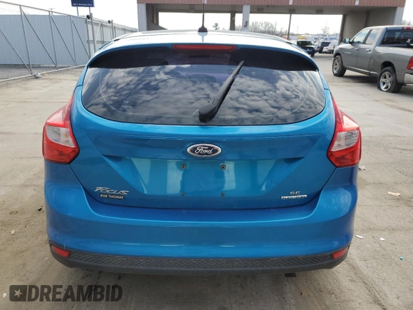 2014 Ford Focus SE z VIN 1FADP3K27EL418984, wystawiony jako Copart lot #53505085 z przebiegiem 118 980 mil mil oraz Szkoda całkowita • Salvage title. Historia ofert i sprzedaży dostępna na DreamBid. Obrazek 6.