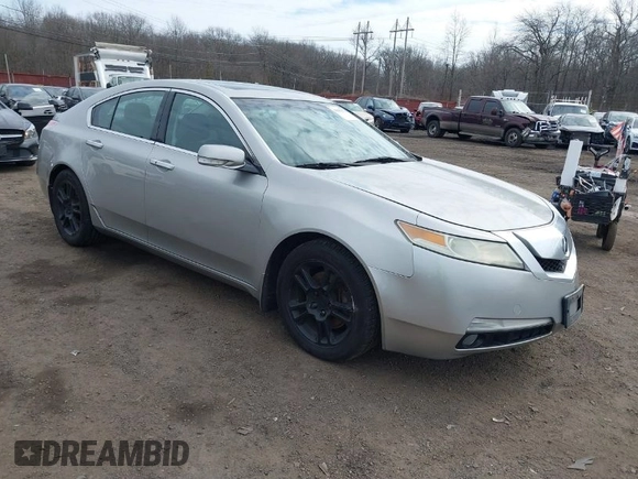 2009 Acura TL Tech with VIN 19UUA86519A013039, listed as a IAAI auction lot 41656570 with 241,217 mi miles. Bid and sale history available at carsss.com. Image 1.
