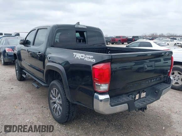 2017 Toyota Tacoma SR5 with VIN 5TFAZ5CN8HX052459, listed as a IAAI auction lot 41495281 with 212,314 mi miles and . Bid and sale history available at DreamBid. Image 3.