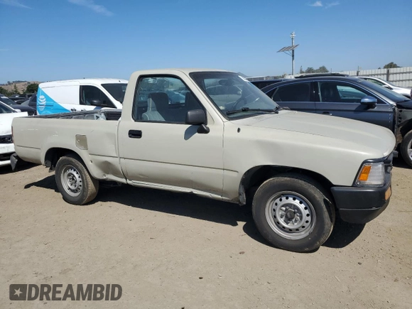 1992 Toyota Pickup z VIN JT4RN81A1N0094217, wystawiony jako Copart lot #56062545 z przebiegiem 242 256 mil mil oraz Szkoda całkowita • Salvage title. Historia ofert i sprzedaży dostępna na DreamBid. Obrazek 4.