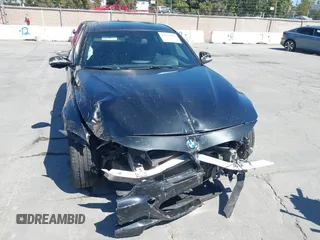 2014 BMW 3 Series 328i with VIN WBA3C1C54EK112620, listed as a IAAI auction lot 42712414 with 169,297 mi miles and . Bid and sale history available at DreamBid. Image 6.