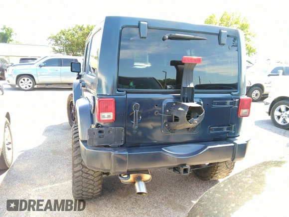 2013 Jeep Wrangler Unlimited Sport z VIN 1C4BJWDG1DL660844, wystawiony jako IAAI lot #42347284 z przebiegiem 168 709 mil mil oraz . Historia ofert i sprzedaży dostępna na DreamBid. Obrazek 16.
